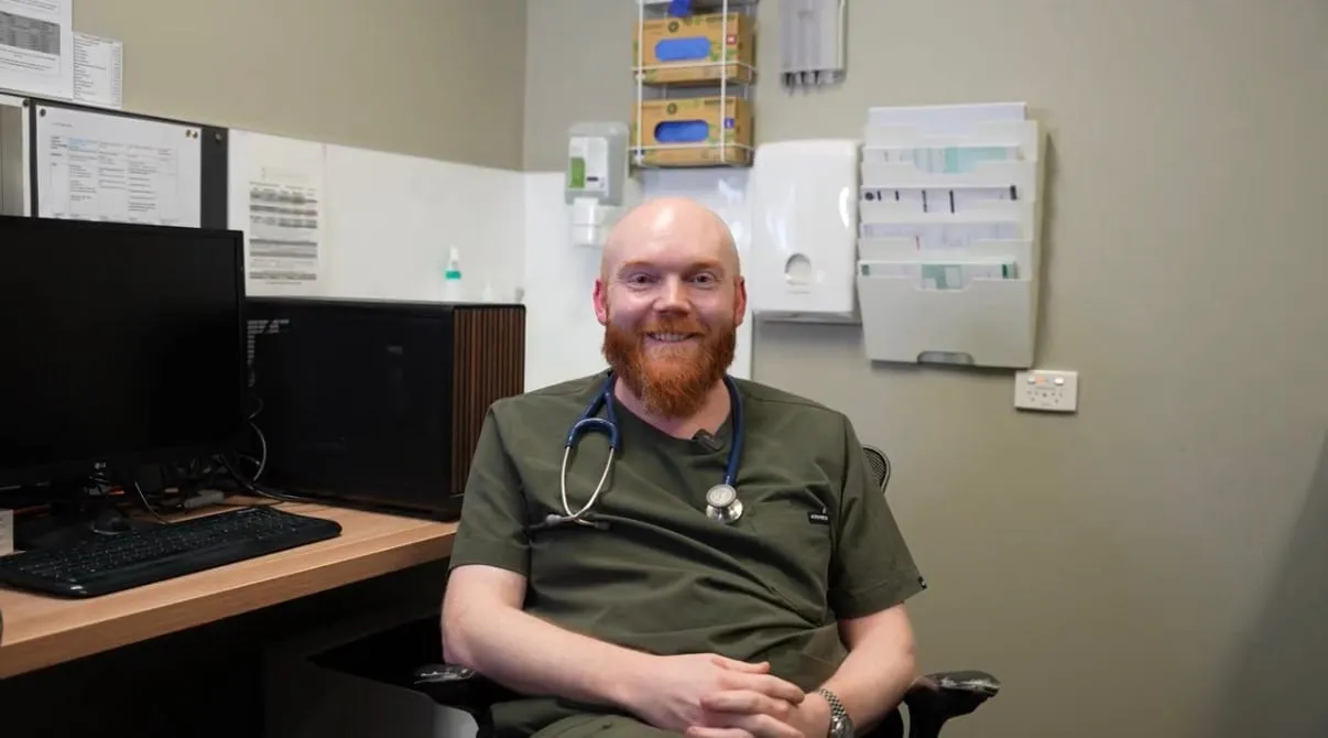 Dr Christopher Irwin, Founder & Medical Director of The Skin Doctor, in a consulting room